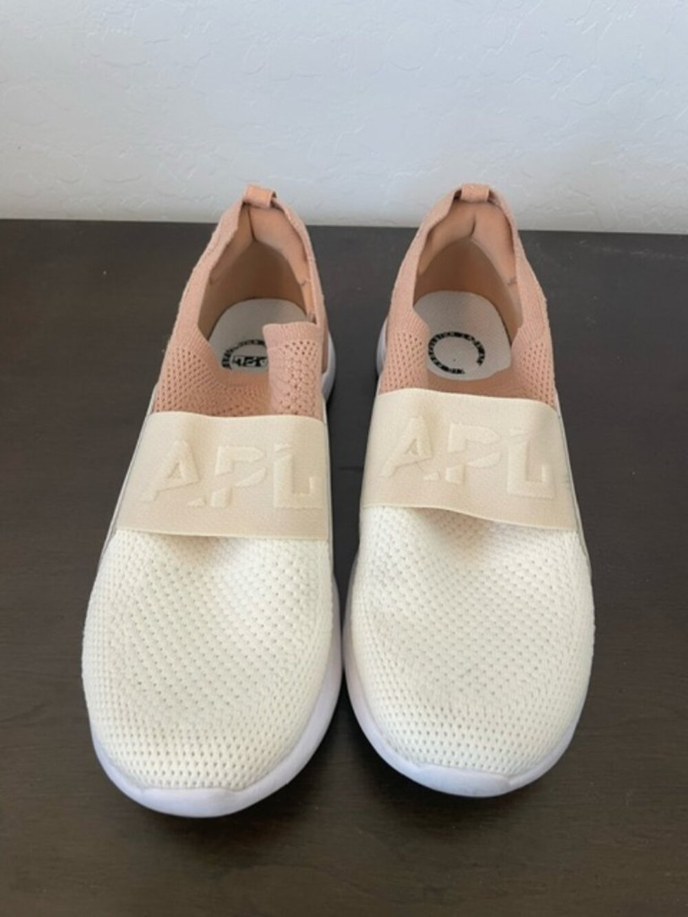 APL Woman’s Size Size 9.5 slip on's EUC tan/white very clean